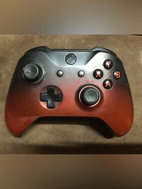 Black and Red Wireless Gaming Controller with Button Backlighting